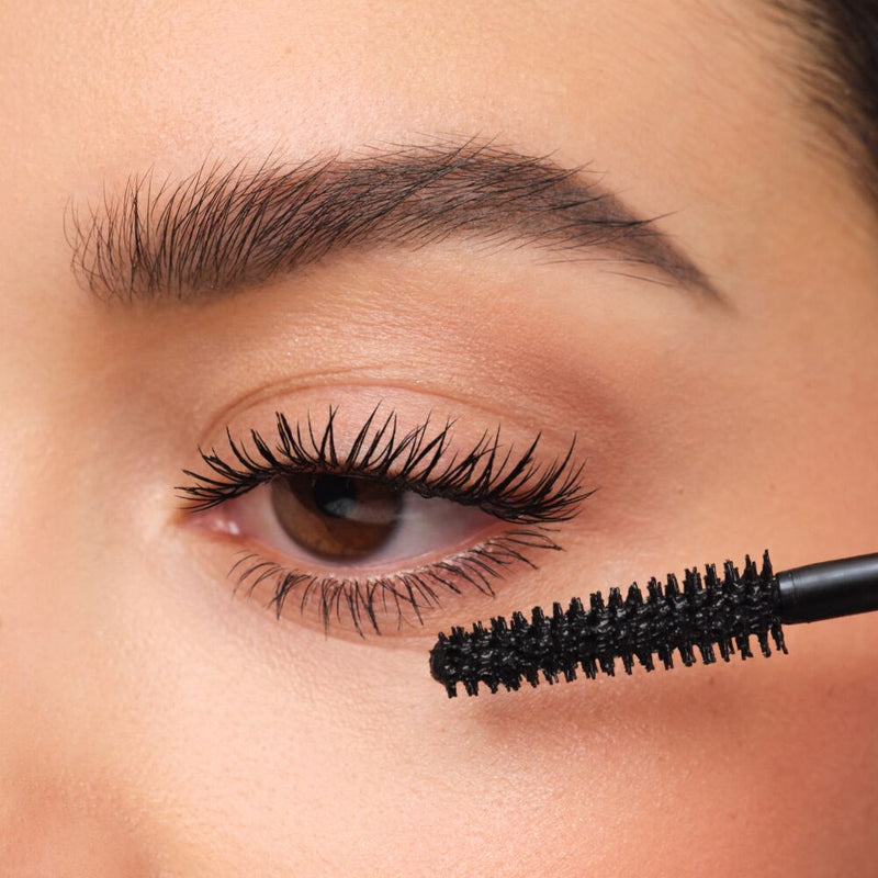 Close-up image of a perfectly applied eye makeup look with lengthened, mascara-coated lashes.