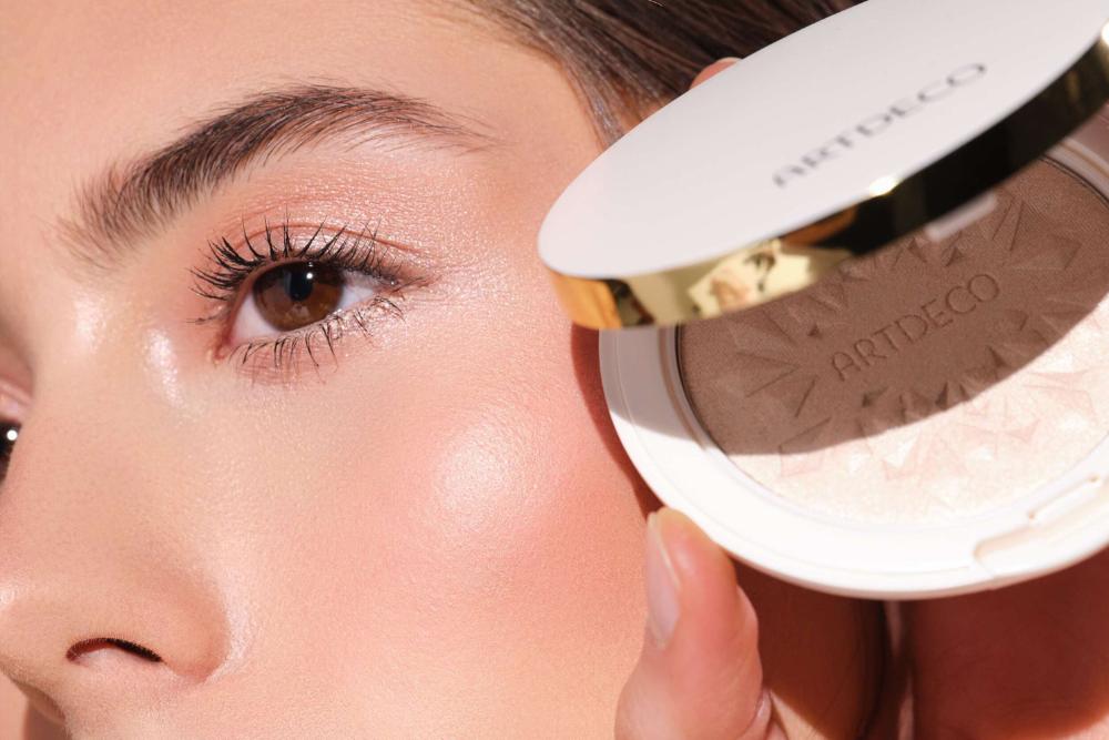 A face is shown on which a highlighter was applied