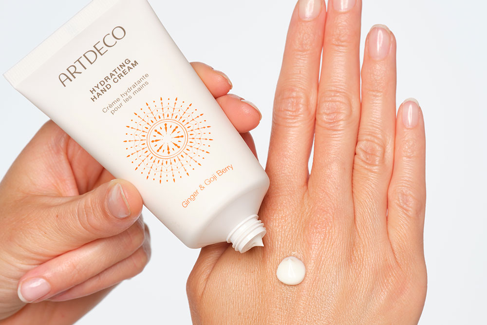 Artdeco Hand Cream is applied to one hand