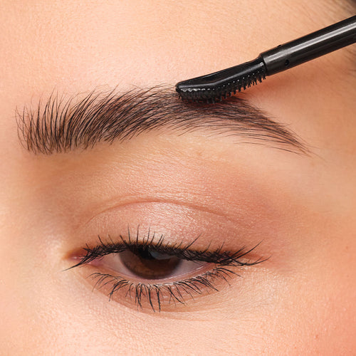 In step 1, the Brow Lift Lamination brush is used to shape the eyebrows.