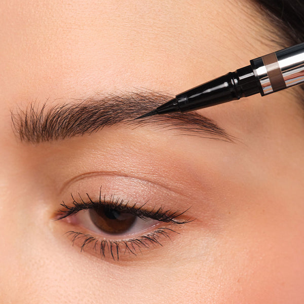 In step 2, natural hairs are traced with the ultra-fine tip of the 24h Micro Brow Liquid Liner