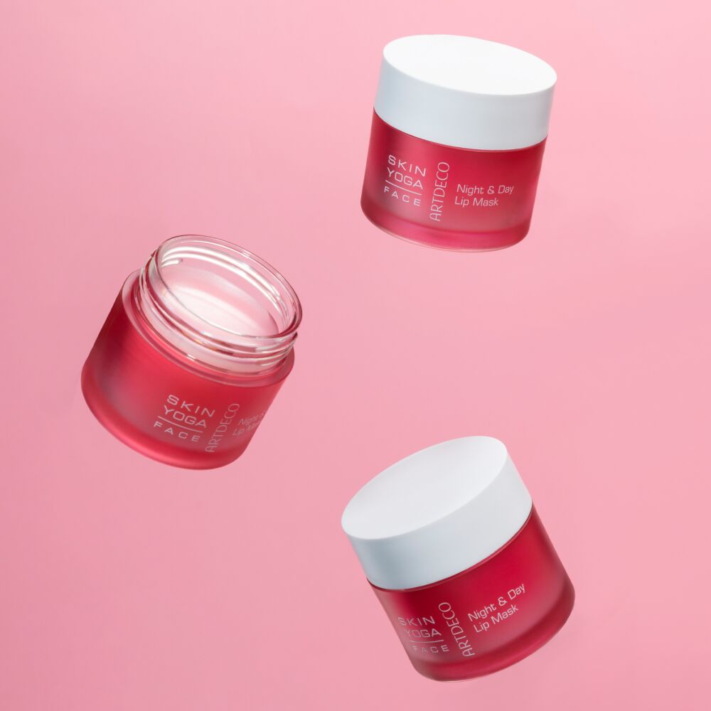 Night & Day Lip Mask is shown floating in front of a pink background