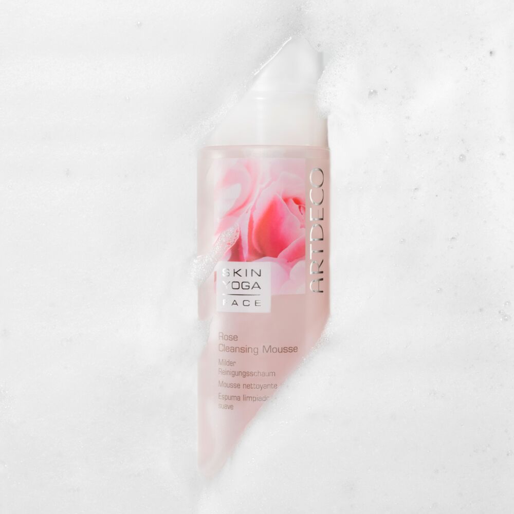 Rose Cleansing Mousse is surrounded by a foamy texture