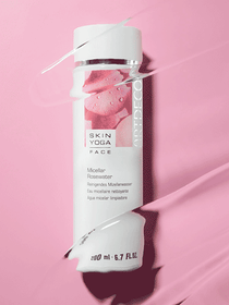 Micellar Rosewater is shown on a pink background
