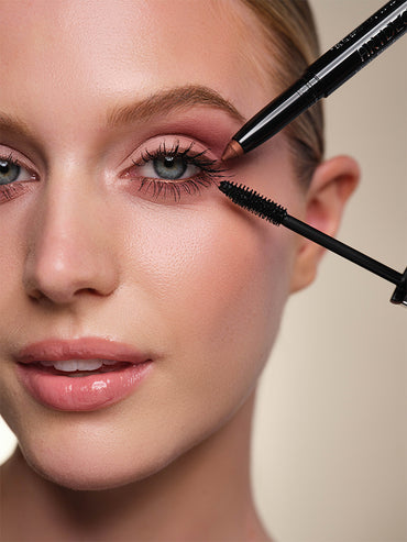 The blue-eyed model wears the evening makeup for blue eyes look