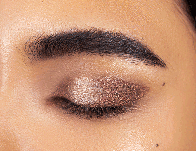 Set highlights with a bright shimmer eyeshadow