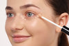 A concealer is placed under the eyes