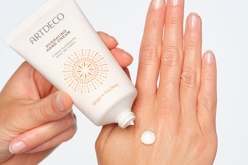 Artdeco Hand Cream is applied to one hand