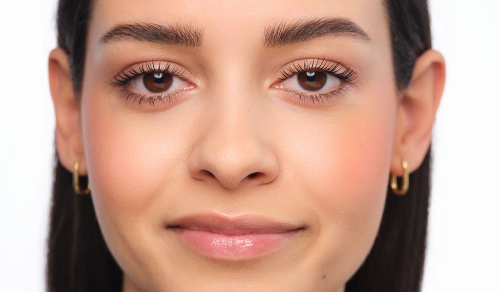Final makeup look featuring brows styled in the Feather Brow technique.