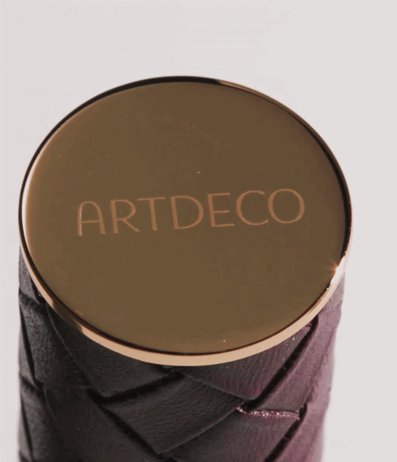 GIF showing how the push-button mechanism for opening the Iconic Lipstick works.