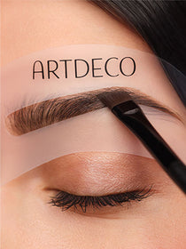 Eyebrows filled in using a stencil and eyebrow powder.