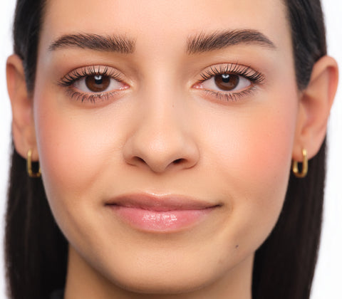 Final makeup look featuring brows styled in the Feather Brow technique.