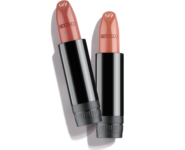Overlay with two refill cartridges of the new Couture Lipstick in nude colors