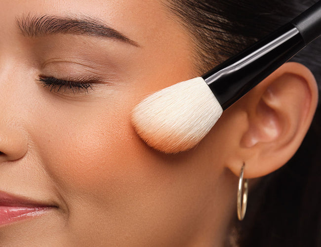 Blush is applied with a Blusher Brush at the highest point of the cheekbone