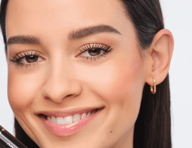 Lines are drawn under and above the eyebrows with white Kajal liner to determine which hairs should be plucked and which should stay.