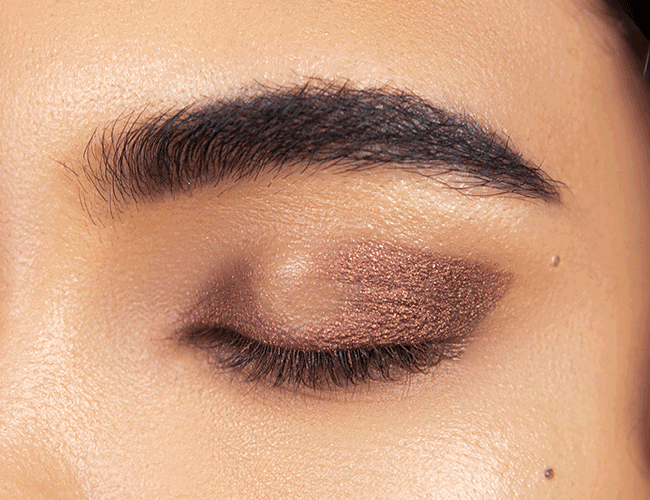 Emphasize your outer corner of the eye with a bronze tone